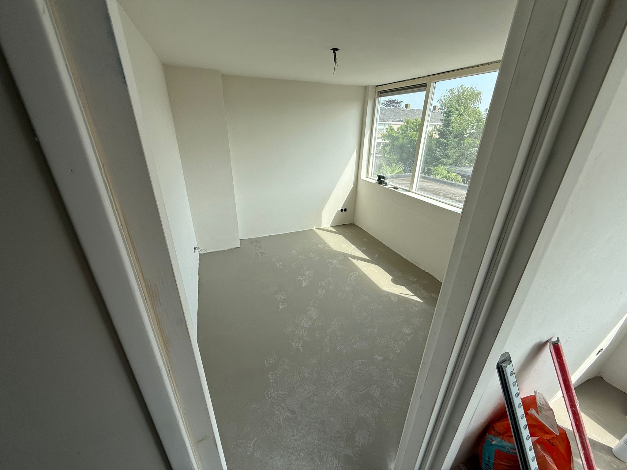 Strak stucwerk muur